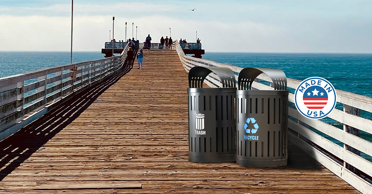 Parkview Dualcoat trash and recycling receptacles on a boardwalk near the ocean