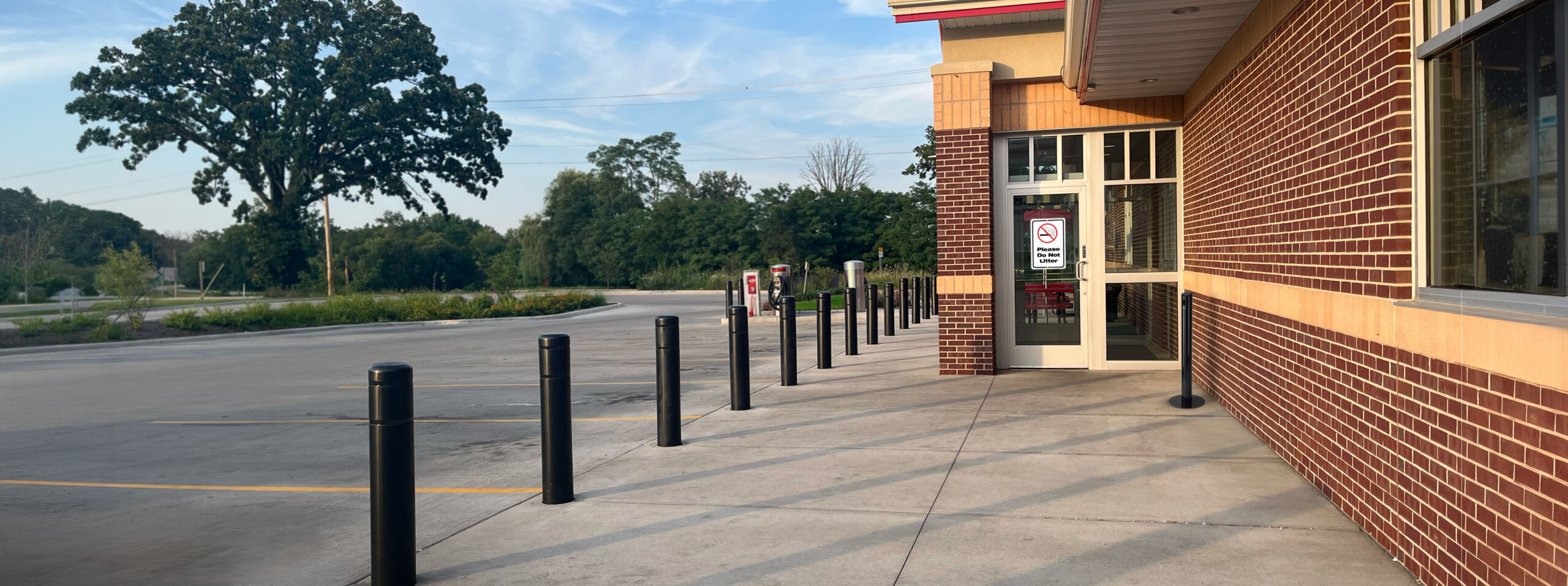 Bollard covers outside of a convenience store creating a safe perimeter